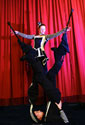 acrobatic circus stilt duet