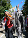 folk festival stilt entertainers