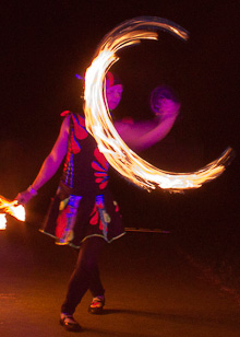 Fire fan display at Music at the creek, majors creek folk festival, Australia, circus