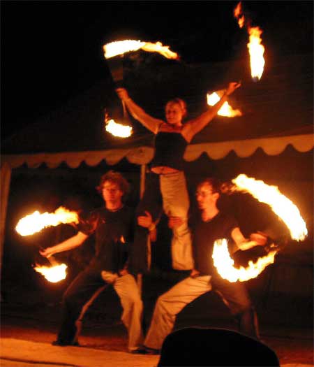 fire tricks human pyramid