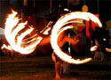 fire fans performance by a will-o'-the-wisp fire entertainer